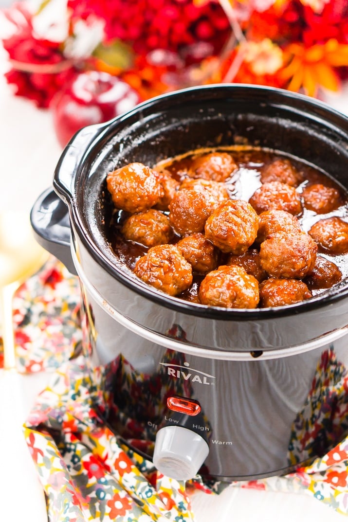 These Apple Cocktail Meatballs are an easy party food appetizer that's made in the slow cooker and loaded with flavors that will tantalize your taste buds!