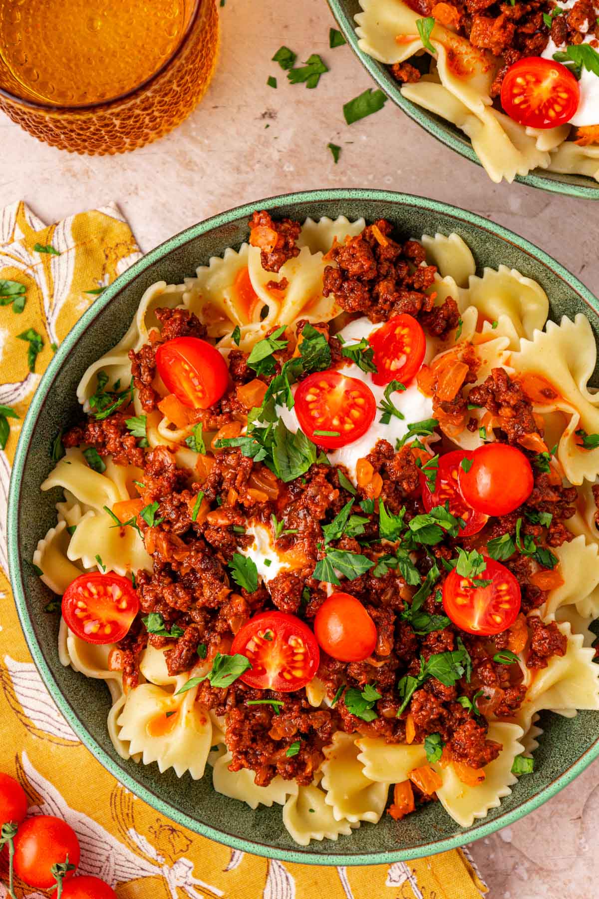 Overhead photo of Anna Paul's Turkish Pasta recipe in a teal bowl.